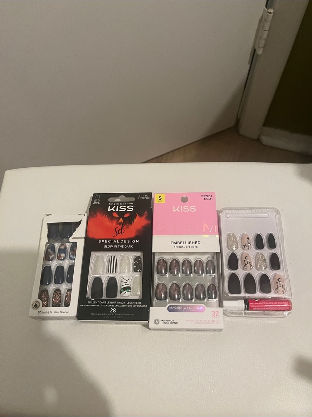 Kiss Assorted Press-On Nail Sets in Black, Silver, Pink and Brown Accents